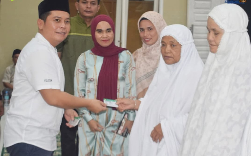 Bupati Palas Serahkan KIS Warga Kurang Mampu